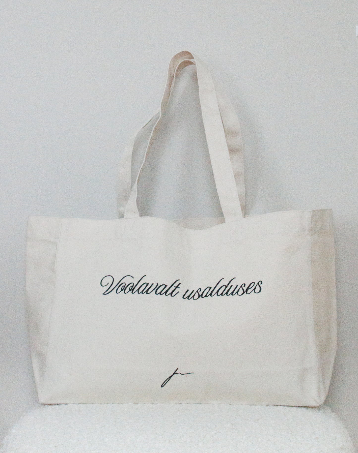 KANVASKOTT SKRIPTFONDIGA "VOOLAVALT USALDUSES"