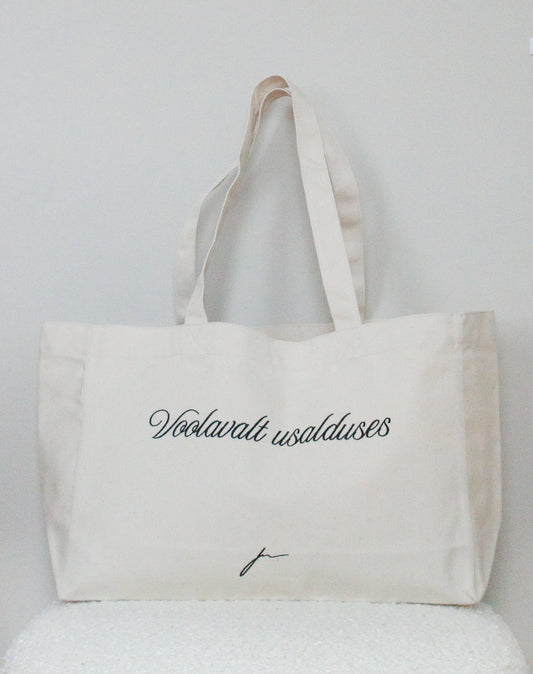 KANVASKOTT SKRIPTFONDIGA "VOOLAVALT USALDUSES"