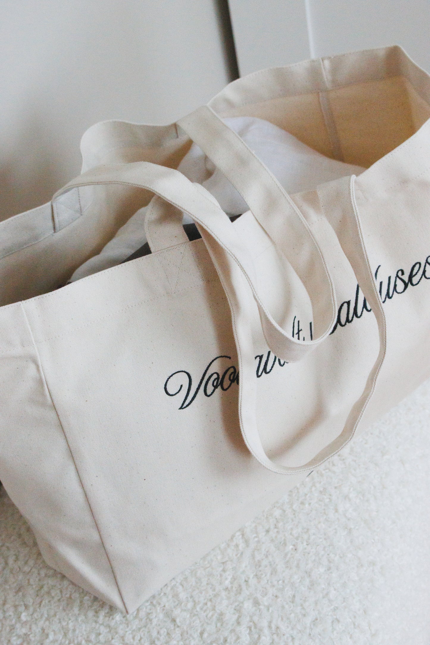 KANVASKOTT SKRIPTFONDIGA "VOOLAVALT USALDUSES"